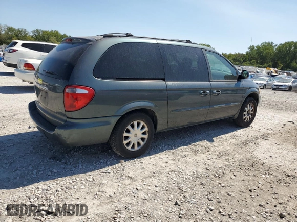 2003 Chrysler Town & Country LX with VIN 2C4GP44L33R162432, listed as a Copart auction lot 69942414 with 153,564 mi miles and Salvage Title. Bid and sale history available at DreamBid. Image 3.