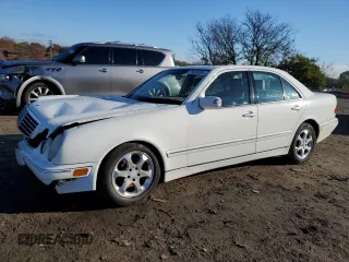 2002 Mercedes-Benz E-Class with VIN WDBJF65J62B423016, listed as a Copart auction lot 79806394 with 154,537 mi miles and Salvage Title. Bid and sale history available at carsss.com. Image 1.