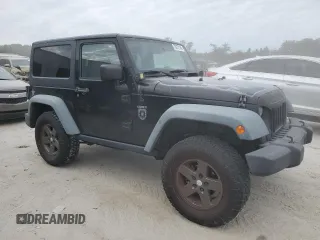 2011 Jeep Wrangler Rubicon with VIN 1J4BA6D15BL585388, listed as a Copart auction lot 76272184 with 119,043 mi miles and Clean title. Bid and sale history available at DreamBid. Image 4.