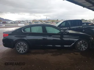 2019 BMW 5 Series 530e iPerformance with VIN WBAJA9C55KB392765, listed as a IAAI auction lot 41748610 with 60,834 mi miles. Bid and sale history available at carsss.com. Image 13.