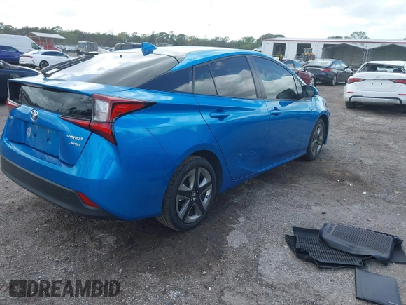 2022 Toyota Prius L Eco with VIN JTDKAMFU5N3165006, listed as a IAAI auction lot 41753470 with 33,567 mi miles and . Bid and sale history available at DreamBid. Image 4.