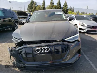 2021 Audi e-tron Premium Plus with VIN WA1LAAGE4MB027773, listed as a Copart auction lot 50399543 with 22,734 mi miles. Bid and sale history available at carsss.com. Image 5.