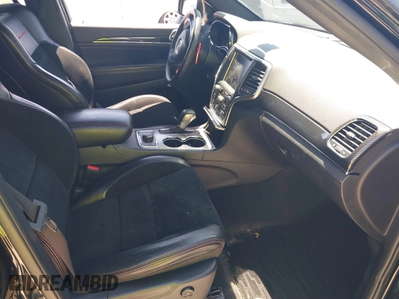2017 Jeep Grand Cherokee Trailhawk with VIN 1C4RJFLG3HC836072, listed as a IAAI auction lot 42073775 with 139,374 mi miles and . Bid and sale history available at DreamBid. Image 5.