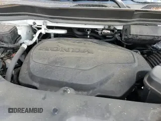 2021 Honda Pilot Touring 8-Passenger z VIN 5FNYF5H96MB011738, wystawiony jako Copart lot #68089255 z przebiegiem 126 655 mil mil oraz Szkoda całkowita • Salvage title. Historia ofert i sprzedaży dostępna na DreamBid. Obrazek 14.