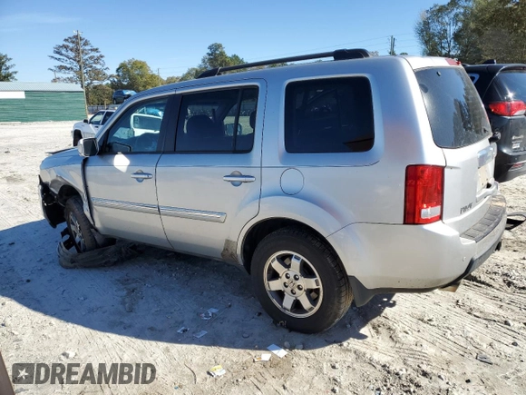2010 Honda Pilot Touring with VIN 5FNYF3H84AB002687, listed as a Copart auction lot 80246724 with 210,934 mi miles and Salvage Title. Bid and sale history available at DreamBid. Image 2.