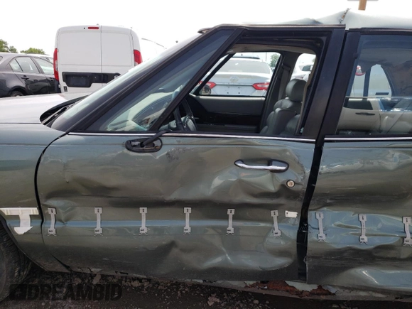 1999 Buick LeSabre Limited with VIN 1G4HR52K2XH469117, listed as a Copart auction lot 61813585 with 149,090 mi miles and Salvage title. Bid and sale history available at DreamBid. Image 7.