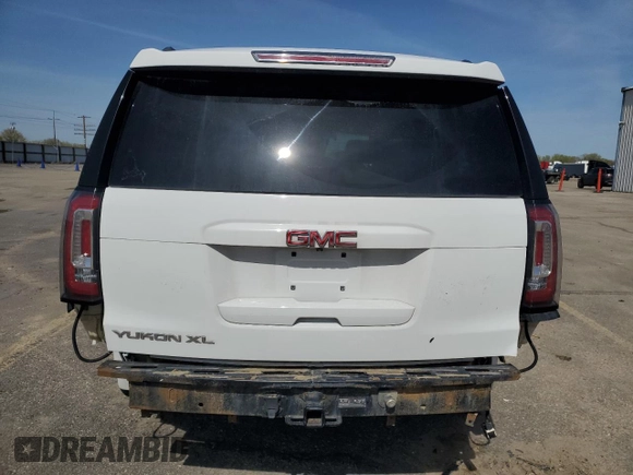 2016 GMC Yukon XL SLT with VIN 1GKS2GKC6GR228033, listed as a Copart auction lot 52450055 with 135,476 mi miles and Salvage Title. Bid and sale history available at DreamBid. Image 6.