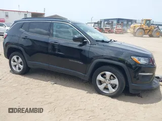 2021 Jeep Compass Latitude with VIN 3C4NJDBB4MT593072, listed as a IAAI auction lot 42215396 with 57,194 mi miles and . Bid and sale history available at DreamBid. Image 1.