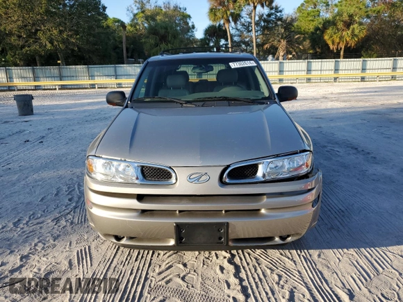 2002 Oldsmobile Bravada z VIN 1GHDT13S022195272, wystawiony jako Copart lot #77302614 z przebiegiem 115 800 mil mil oraz Szkoda całkowita • Salvage title. Historia ofert i sprzedaży dostępna na DreamBid. Obrazek 5.
