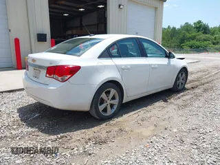 2014 Chevrolet Cruze 2LT z VIN 1G1PE5SB7E7115794, wystawiony jako IAAI lot #42271519 z przebiegiem 160 369 mil mil oraz . Historia ofert i sprzedaży dostępna na DreamBid. Obrazek 4.
