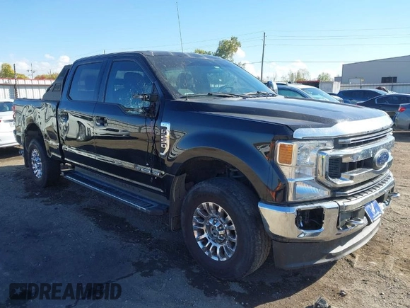 2021 Ford Super Duty F-250 SRW XL with VIN 1FT7W2BT4MEC88324, listed as a IAAI auction lot 40584769 with 163,379 mi miles. Bid and sale history available at carsss.com. Image 1.