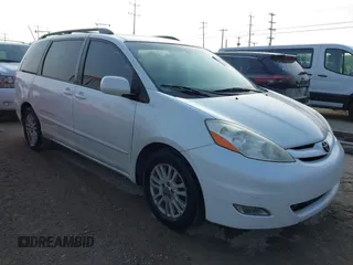 2009 Toyota Sienna XLE with VIN 5TDZK22C19S227678, listed as a IAAI auction lot 42074502 with 173,718 mi miles. Bid and sale history available at carsss.com. Image 1.