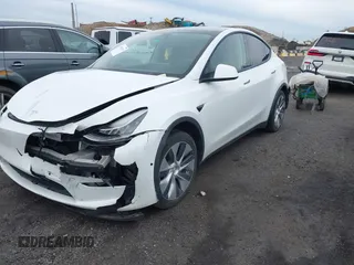 2022 Tesla Model Y Long Range z VIN 7SAYGDEE7NF389788, wystawiony jako IAAI lot #42014111 z przebiegiem 37 606 mil mil oraz . Historia ofert i sprzedaży dostępna na DreamBid. Obrazek 22.