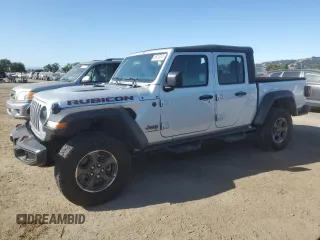 2023 Jeep Gladiator Rubicon с VIN 1C6JJTBG0PL526626, выставлен на аукционе Copart как лот 58415345 с пробегом 27 101 миль миль и Списание • Salvage title. История ставок и продаж доступна на DreamBid. Изображение 1.