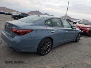 2024 Infiniti Q50 Red Sport 400 with VIN JN1FV7DPXRM660535, listed as a Copart auction lot 82416994 with 2,822 mi miles and Salvage Title. Bid and sale history available at DreamBid. Image 3.