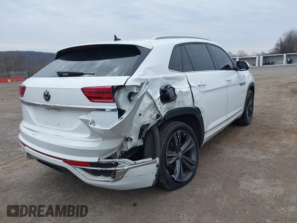 2021 Volkswagen Atlas SE z VIN 1V2RE2CA2MC205086, wystawiony jako IAAI lot #41902654 z przebiegiem 111 024 mil mil oraz . Historia ofert i sprzedaży dostępna na DreamBid. Obrazek 6.
