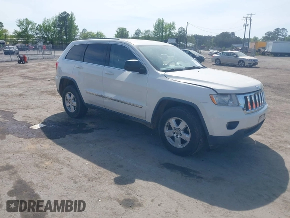 2012 Jeep Grand Cherokee Laredo with VIN 1C4RJFAG2CC176313, listed as a IAAI auction lot 42098127 with 162,556 mi miles. Bid and sale history available at carsss.com. Image 1.
