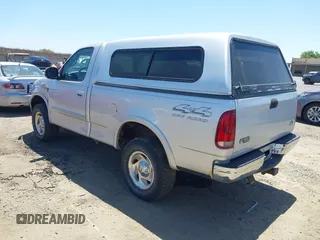 2000 Ford F-150 XL z VIN 1FTRF18L1YKA63179, wystawiony jako IAAI lot #42532771 z przebiegiem 116 604 mil mil oraz . Historia ofert i sprzedaży dostępna na DreamBid. Obrazek 3.