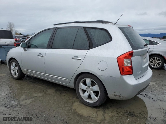 2007 Kia Rondo EX with VIN KNAFG526777097684, listed as a Copart auction lot 86523364 with 198,196 mi miles and Clean Title. Bid and sale history available at carsss.com. Image 2.