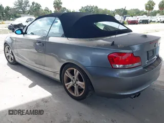 2009 BMW 1 Series 128i with VIN WBAUL73509VJ75662, listed as a IAAI auction lot 42639936 with 96,542 mi miles and . Bid and sale history available at DreamBid. Image 3.