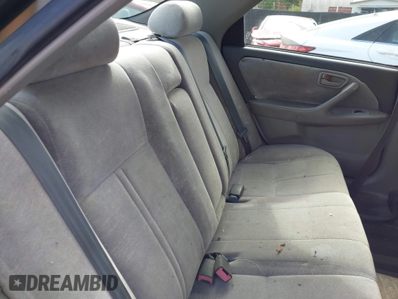 1999 Toyota Camry LE z VIN JT2BF22K2X0164080, wystawiony jako IAAI lot #40984874 z przebiegiem Nie podano mil oraz . Historia ofert i sprzedaży dostępna na DreamBid. Obrazek 8.