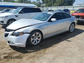 2004 BMW 6 Series 645Ci with VIN WBAEH73464B190870, listed as a Copart auction lot 71056994 with 124,715 mi miles and Salvage Title. Bid and sale history available at carsss.com. Image 1.