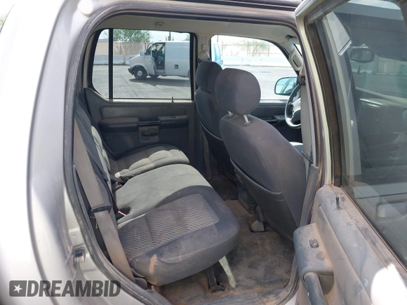 2004 Ford Explorer Sport Trac XLS z VIN 1FMZU77K64UB93602, wystawiony jako IAAI lot #42737380 z przebiegiem 224 488 mil mil oraz . Historia ofert i sprzedaży dostępna na DreamBid. Obrazek 8.