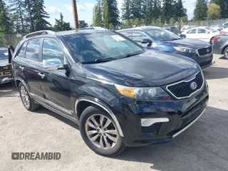 2012 Kia Sorento SX with VIN 5XYKWDA26CG258262, listed as a IAAI auction lot 42068704 with 124,832 mi miles. Bid and sale history available at carsss.com. Image 1.