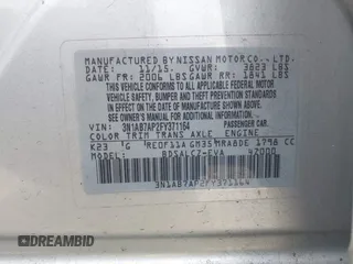 2015 Nissan Sentra SR with VIN 3N1AB7AP2FY371164, listed as a IAAI auction lot 39242588 with 111,479 mi miles and . Bid and sale history available at DreamBid. Image 9.