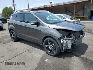 2015 Ford Escape Titanium with VIN 1FMCU9J98FUB49112, listed as a Copart auction lot 58989915 with 94,060 mi miles and Salvage title. Bid and sale history available at DreamBid. Image 4.