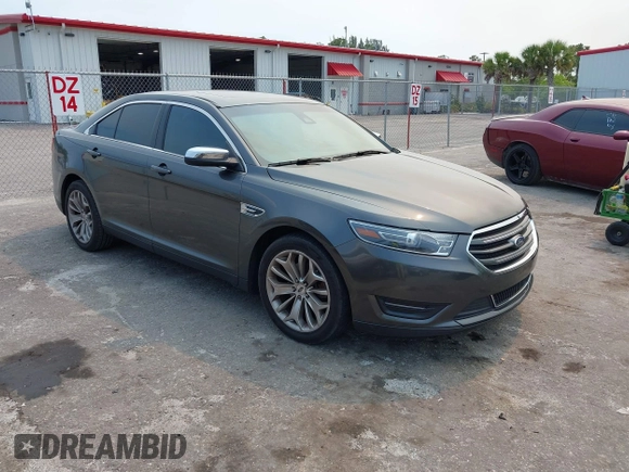 2018 Ford Taurus Limited z VIN 1FAHP2F8XJG129966, wystawiony jako IAAI lot #42319661 z przebiegiem 112 937 mil mil oraz . Historia ofert i sprzedaży dostępna na DreamBid. Obrazek 1.