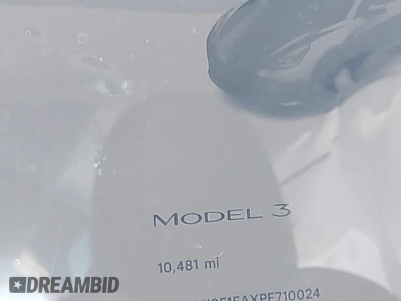 2023 Tesla Model 3 z VIN 5YJ3E1EAXPF710024, wystawiony jako IAAI lot #41228608 z przebiegiem 10 481 mil mil oraz . Historia ofert i sprzedaży dostępna na DreamBid. Obrazek 7.