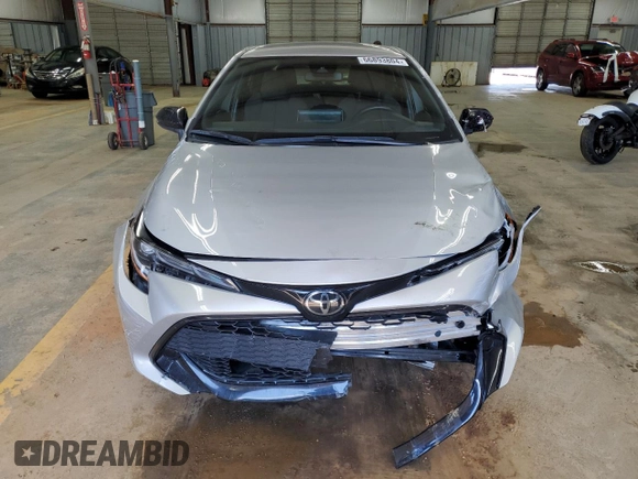 2022 Toyota Corolla Hatchback SE with VIN JTND4MBE4N3188612, listed as a Copart auction lot 66893804 with 59,574 mi miles and Salvage Title. Bid and sale history available at carsss.com. Image 5.