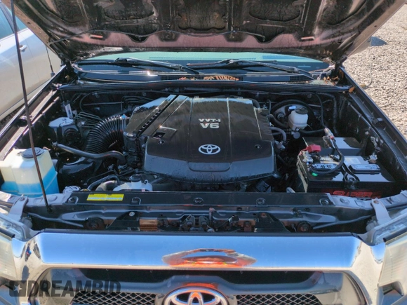 2012 Toyota Tacoma z VIN 5TFUU4EN2CX046135, wystawiony jako Copart lot #59400405 z przebiegiem 105 033 mil mil oraz Szkoda całkowita • Salvage title. Historia ofert i sprzedaży dostępna na DreamBid. Obrazek 11.