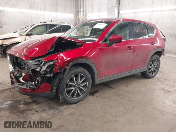2018 Mazda CX-5 Grand Touring with VIN JM3KFBDM5J0414013, listed as a IAAI auction lot 42013479 with 88,225 mi miles and . Bid and sale history available at DreamBid. Image 18.
