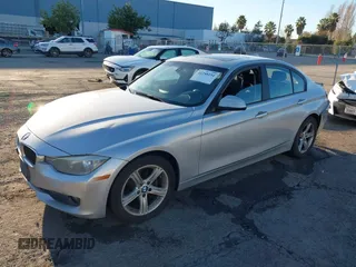 2013 BMW 3 Series 320i with VIN WBA3B1C53DK129703, listed as a IAAI auction lot 41295234 with 175,506 mi miles. Bid and sale history available at carsss.com. Image 16.