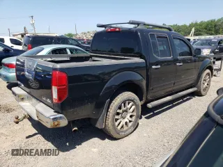 2010 Nissan Frontier Pro-4X with VIN 1N6AD0EV1AC447205, listed as a Copart auction lot 62007355 with 128,371 mi miles and Clean title. Bid and sale history available at DreamBid. Image 3.