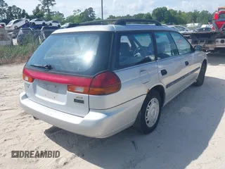 1996 Subaru Legacy L with VIN 4S3BK4352T6318494, listed as a IAAI auction lot 42162704 with 272,055 mi miles and . Bid and sale history available at DreamBid. Image 4.
