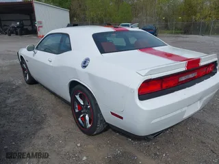 2013 Dodge Challenger SXT with VIN 2C3CDYAG9DH734248, listed as a IAAI auction lot 41837944 with 113,142 mi miles. Bid and sale history available at carsss.com. Image 3.
