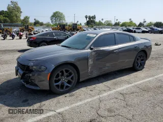 2020 Dodge Charger SXT with VIN 2C3CDXBG7LH252028, listed as a Copart auction lot 58924485 with 64,563 mi miles and Salvage title. Bid and sale history available at DreamBid. Image 1.