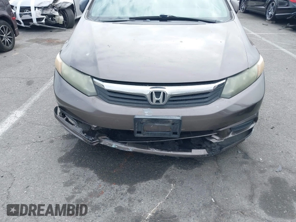 2012 Honda Civic EX with VIN 2HGFB2F89CH517330, listed as a IAAI auction lot 42116208 with 196,861 mi miles and . Bid and sale history available at DreamBid. Image 6.