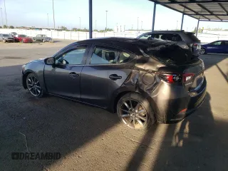 2018 Mazda 3 Touring z VIN 3MZBN1L30JM195471, wystawiony jako Copart lot #57497115 z przebiegiem 147 899 mil mil oraz Szkoda całkowita • Salvage title. Historia ofert i sprzedaży dostępna na DreamBid. Obrazek 2.