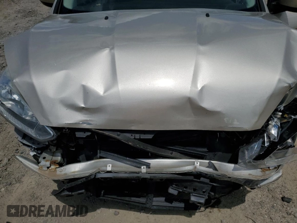 2018 Ford Focus SE z VIN 1FADP3F27JL226890, wystawiony jako Copart lot #56505085 z przebiegiem 112 865 mil mil oraz Szkoda całkowita • Salvage title. Historia ofert i sprzedaży dostępna na DreamBid. Obrazek 11.