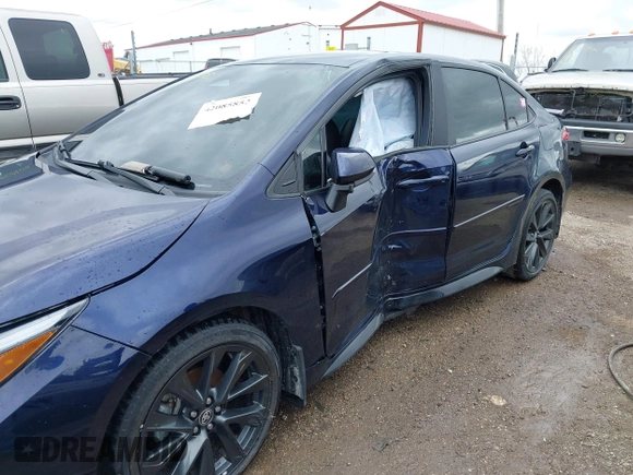 2023 Toyota Corolla SE with VIN 5YFS4MCE2PP143401, listed as a IAAI auction lot 42085852 with 50,959 mi miles and . Bid and sale history available at DreamBid. Image 6.