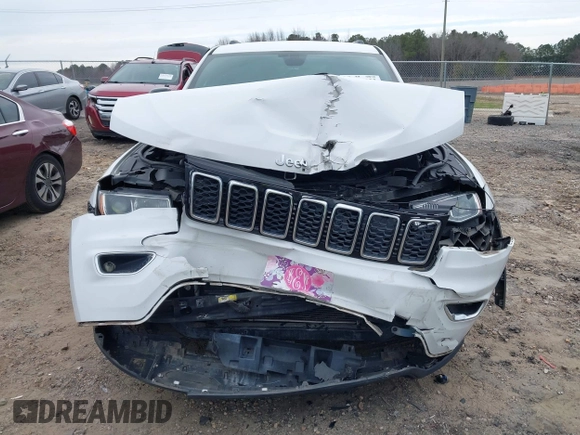 2018 Jeep Grand Cherokee Laredo E with VIN 1C4RJEAG7JC322888, listed as a IAAI auction lot 41756833 with 129,988 mi miles and . Bid and sale history available at DreamBid. Image 12.