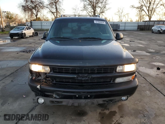 2001 Chevrolet Suburban LS z VIN 3GNFK16T91G221421, wystawiony jako Copart lot #87094634 z przebiegiem 186 977 mil mil oraz Szkoda całkowita • Salvage title. Historia ofert i sprzedaży dostępna na DreamBid. Obrazek 5.