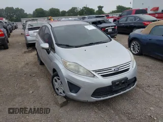 2013 Ford Fiesta SE with VIN 3FADP4BJXDM220183, listed as a IAAI auction lot 42026592 with 153,396 mi miles. Bid and sale history available at carsss.com. Image 1.