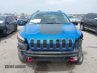 2018 Jeep Cherokee Trailhawk with VIN 1C4PJMBX6JD569684, listed as a IAAI auction lot 41925325 with 149,446 mi miles and . Bid and sale history available at DreamBid. Image 13.