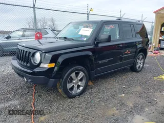 2017 Jeep Patriot High Altitude with VIN 1C4NJRFB3HD165206, listed as a IAAI auction lot 41644912 with 124,151 mi miles. Bid and sale history available at carsss.com. Image 2.