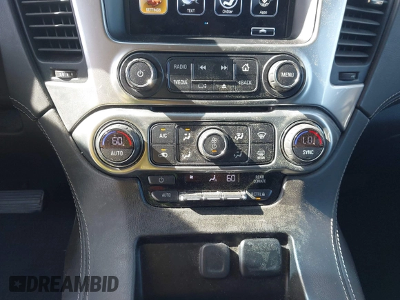 2019 Chevrolet Suburban LS with VIN 1GNSKGKC2KR353977, listed as a IAAI auction lot 42129814 with 85,454 mi miles and . Bid and sale history available at DreamBid. Image 17.